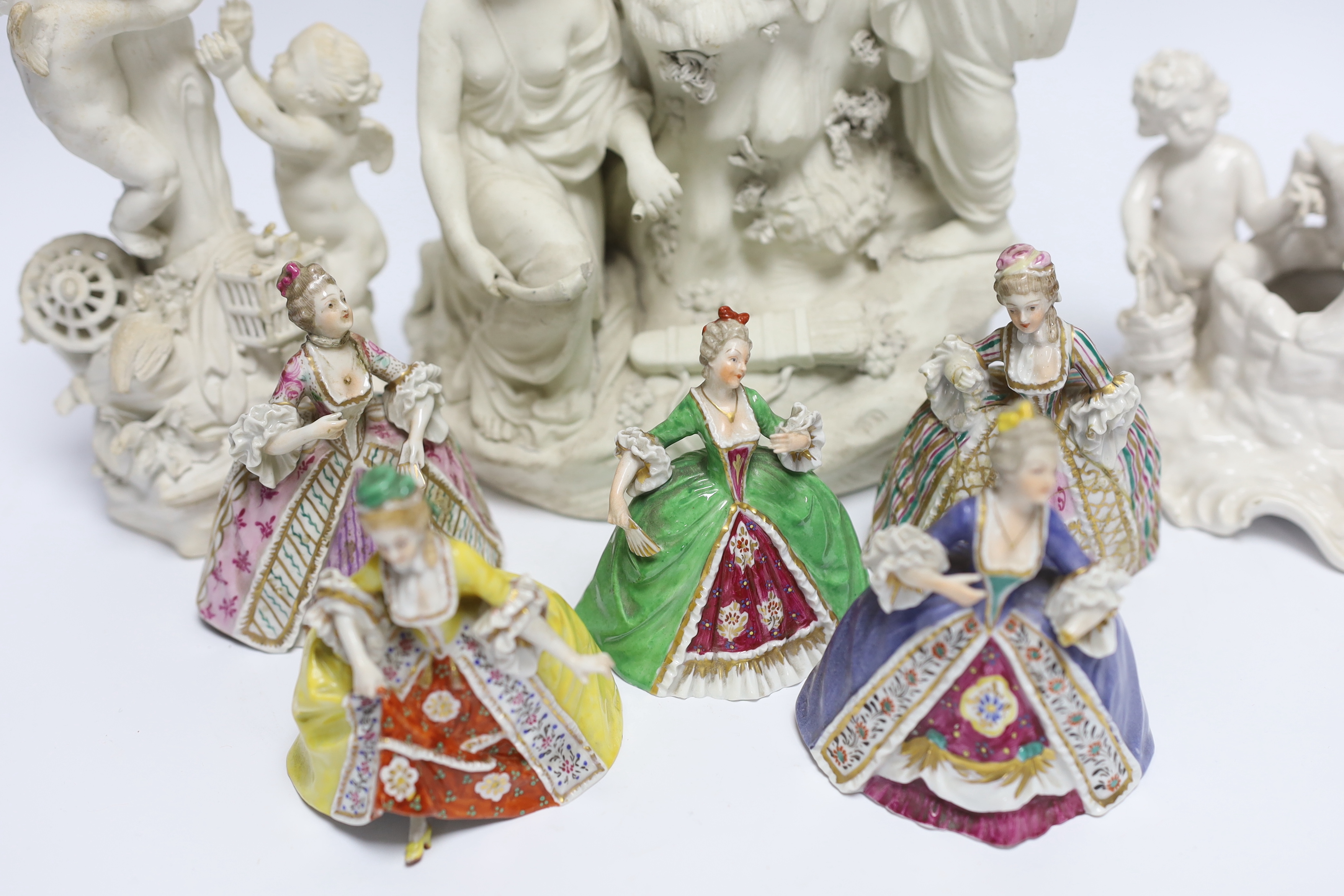 Two late 18th century biscuit figural centrepieces, six figurines and another, tallest 40cm